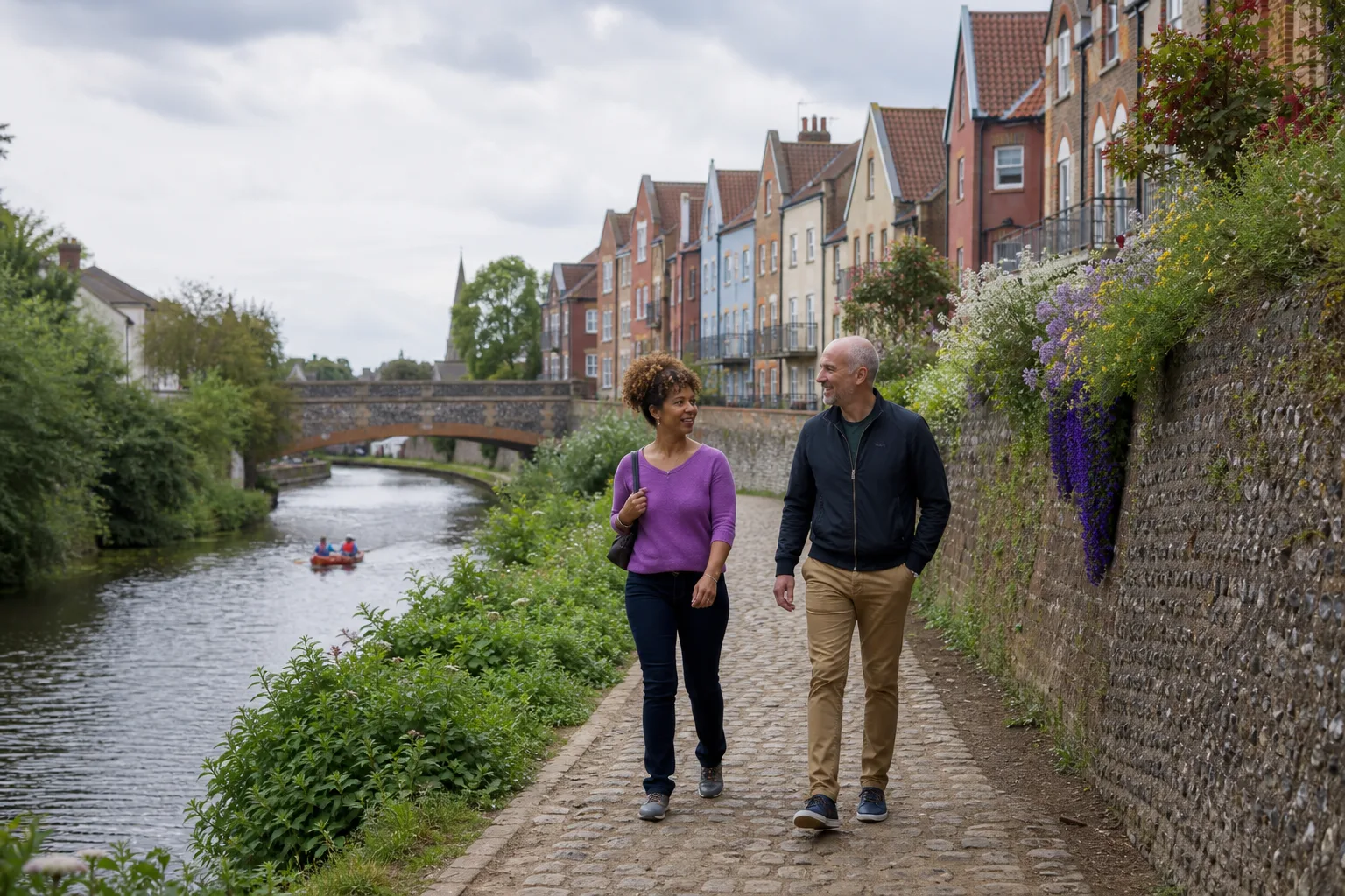 Divorced single adult enjoying a relaxed walk beside the River Wensum in Norwich